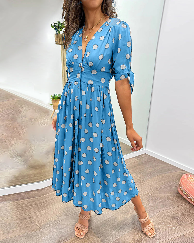 Lucia | Elegante midi-jurk met speelse stippenprint