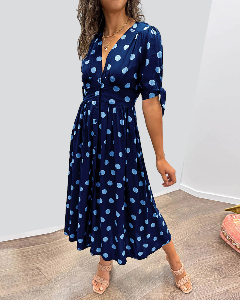 Lucia | Elegante midi-jurk met speelse stippenprint
