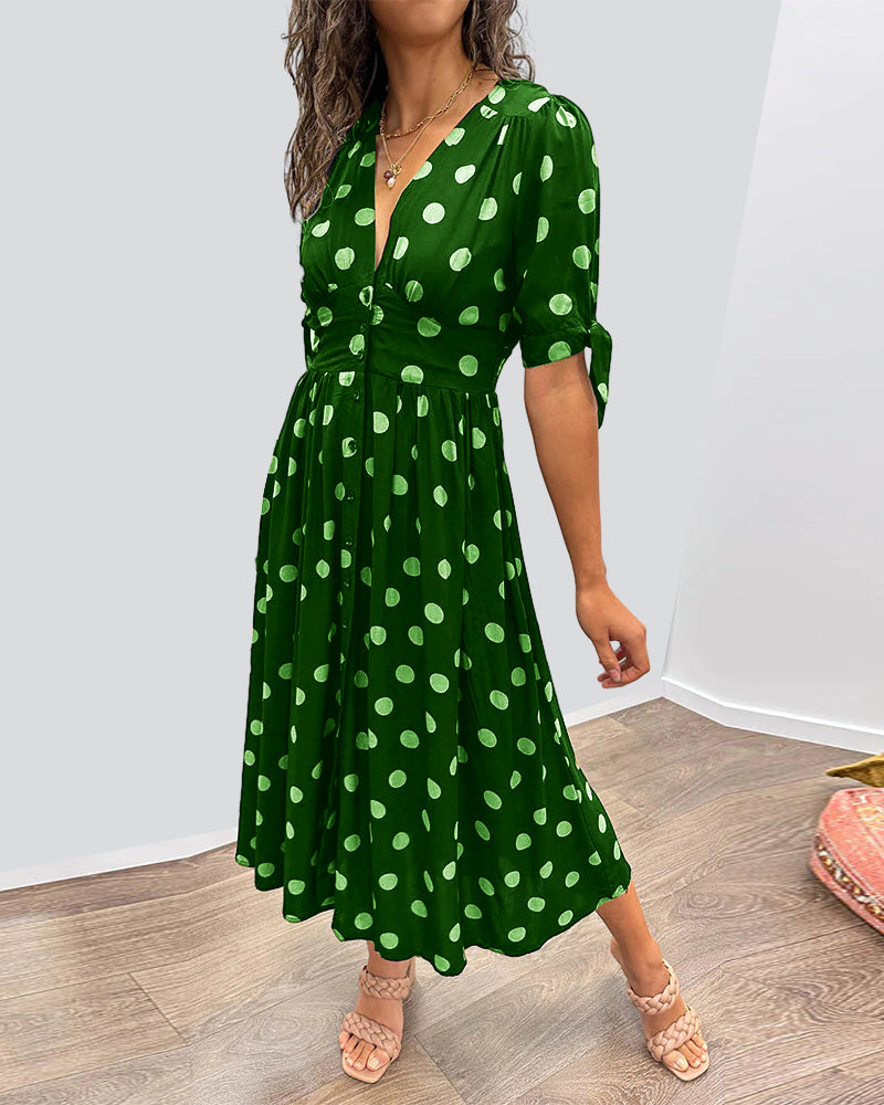 Lucia | Elegante midi-jurk met speelse stippenprint