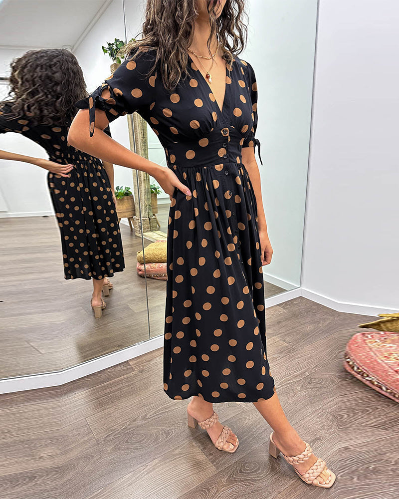 Lucia | Elegante midi-jurk met speelse stippenprint