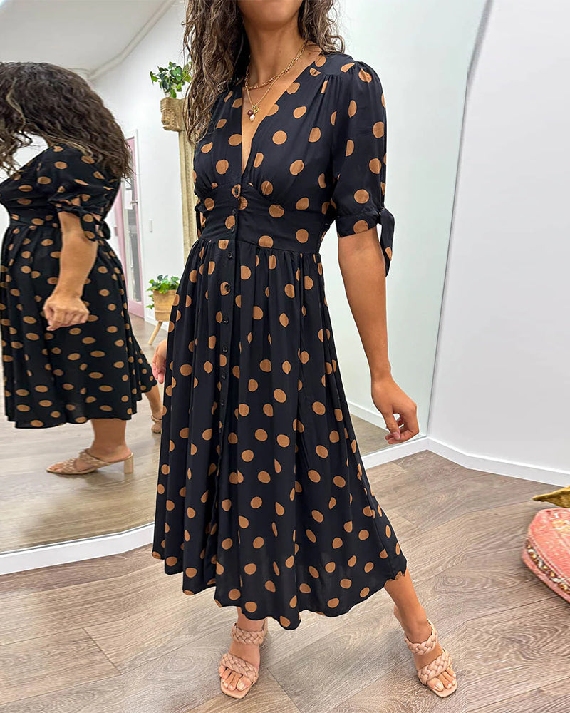 Lucia | Elegante midi-jurk met speelse stippenprint