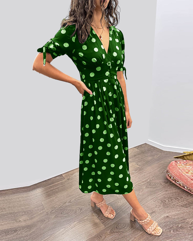 Lucia | Elegante midi-jurk met speelse stippenprint