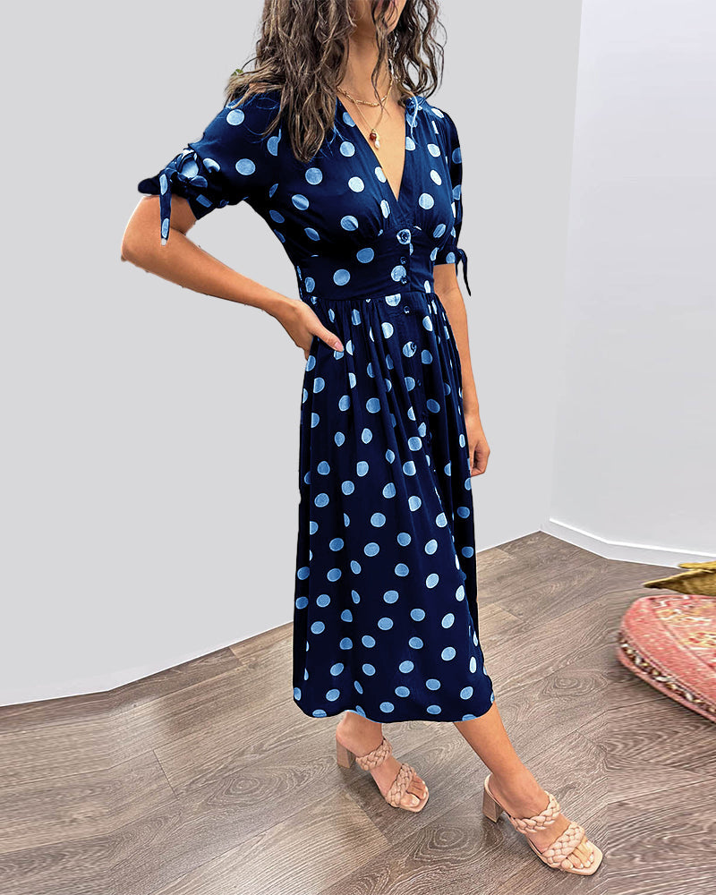 Lucia | Elegante midi-jurk met speelse stippenprint