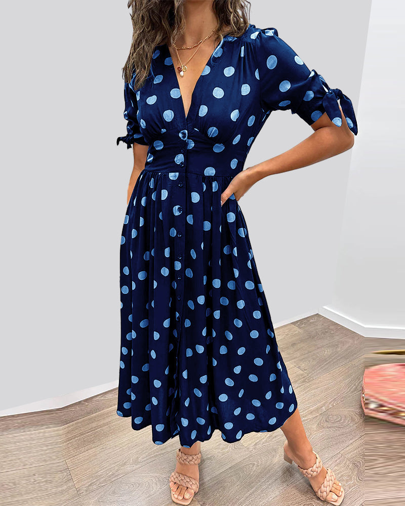 Lucia | Elegante midi-jurk met speelse stippenprint