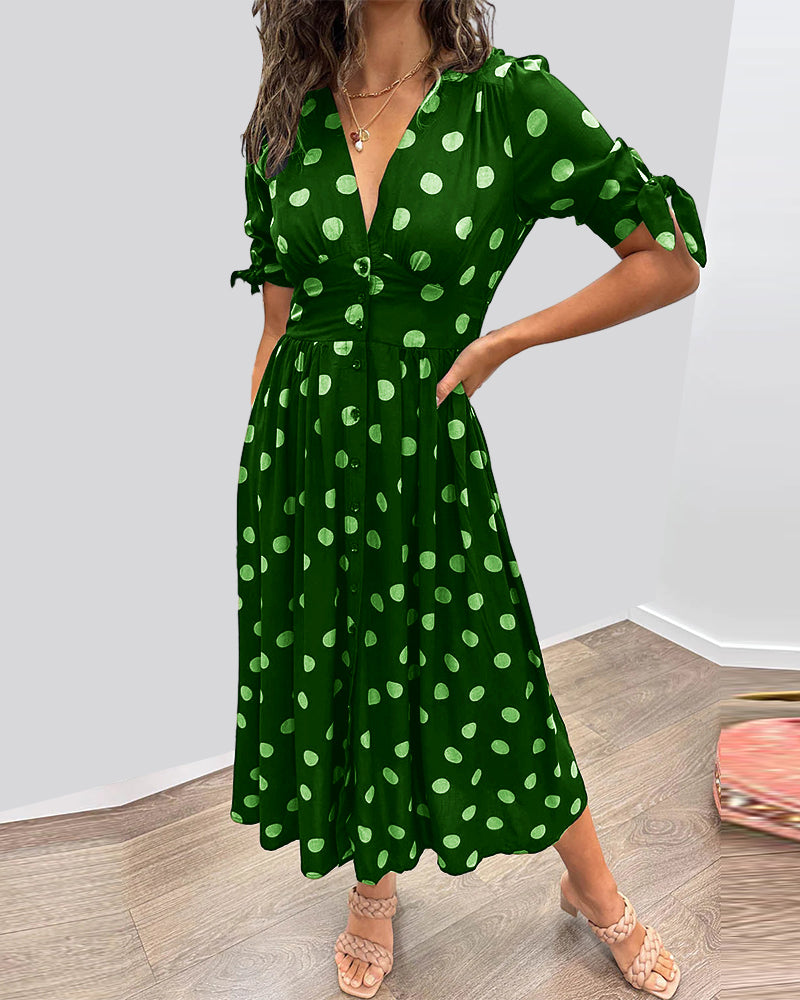 Lucia | Elegante midi-jurk met speelse stippenprint