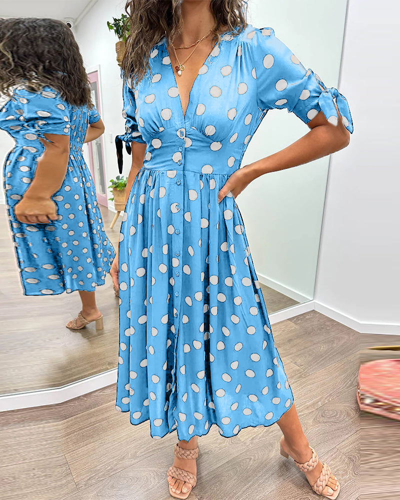 Lucia | Elegante midi-jurk met speelse stippenprint