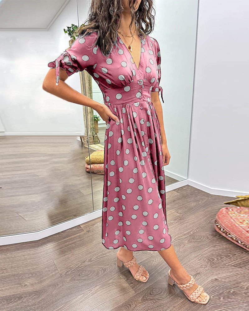 Lucia | Elegante midi-jurk met speelse stippenprint