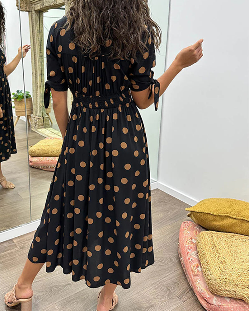 Lucia | Elegante midi-jurk met speelse stippenprint