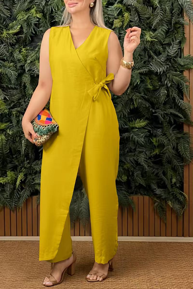 Fae | Mouwloze wikkel jumpsuit met strikdetail
