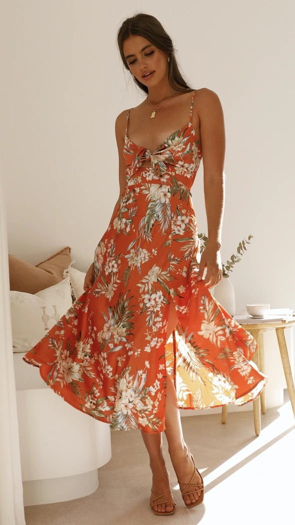 Isabella | Midi-jurk met strikdetail en bloemenprint