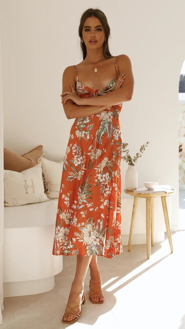 Isabella | Midi-jurk met strikdetail en bloemenprint