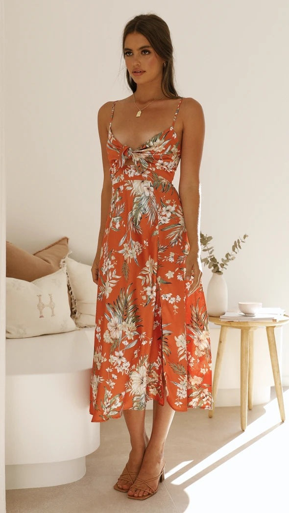 Isabella | Midi-jurk met strikdetail en bloemenprint