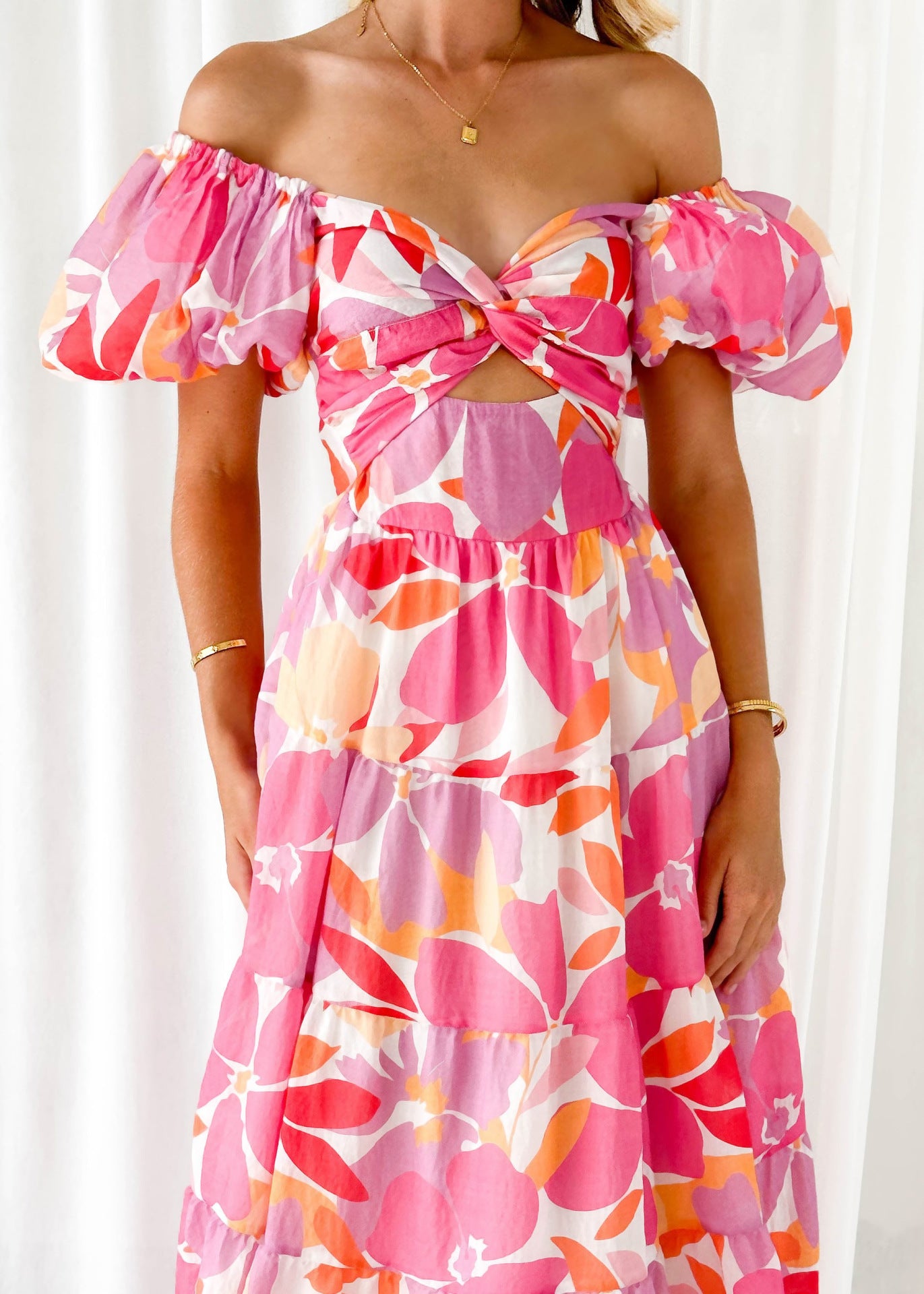 Isla | Maxi-jurk met taillecut-out en print