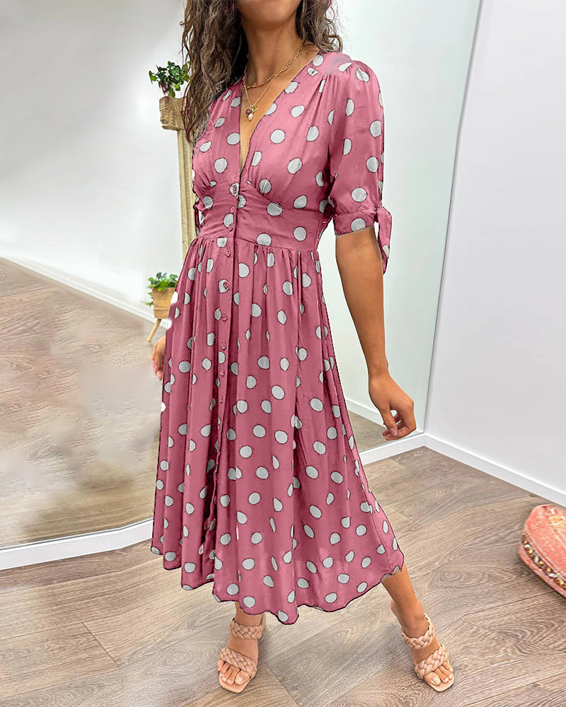 Lucia | Elegante midi-jurk met speelse stippenprint