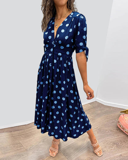Lucia | Elegante midi-jurk met speelse stippenprint