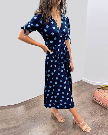 Lucia | Elegante midi-jurk met speelse stippenprint