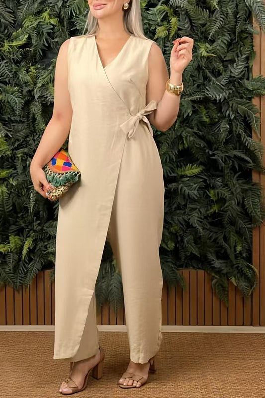 Fae | Mouwloze wikkel jumpsuit met strikdetail