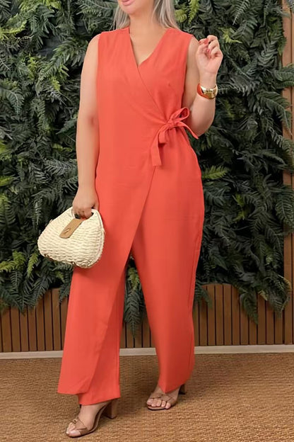 Fae | Mouwloze wikkel jumpsuit met strikdetail