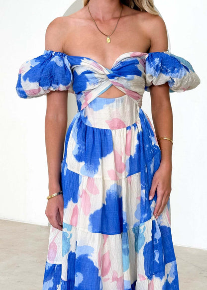 Isla | Maxi-jurk met taillecut-out en print