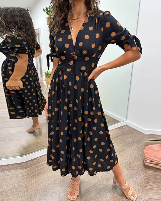 Lucia | Elegante midi-jurk met speelse stippenprint